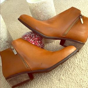 Brown flat heeled ankle boots